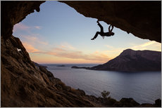 Wall sticker  Climber in a cave at sunset