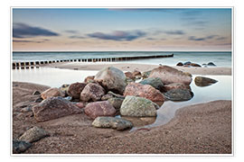 Poster Stones and groynes on shore of the Baltic Sea.
