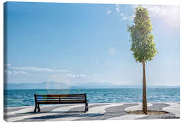 Canvas print  Shore of Lake Garda with Alps on the horizon